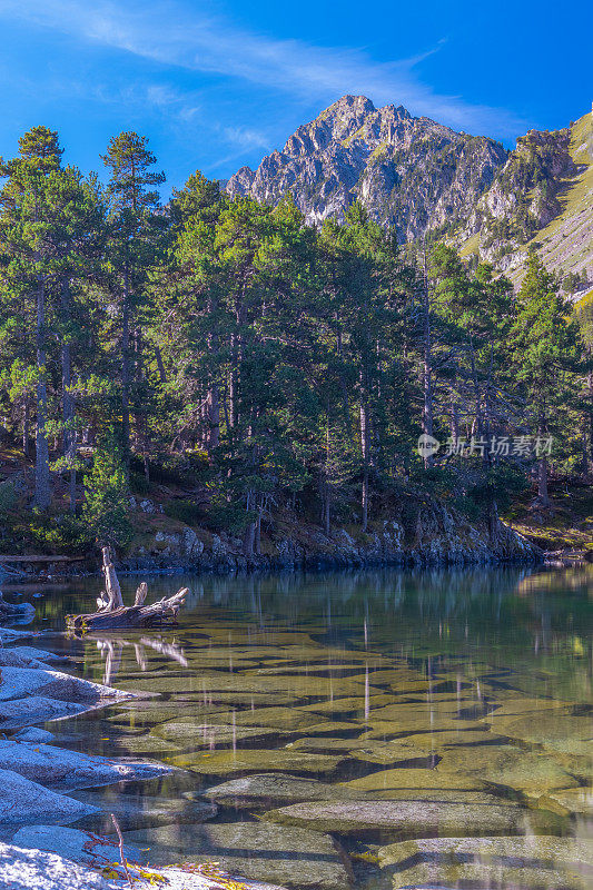 Lake of Sant Maurici in the heart of nature in Aigüestortes, Lleida, Catalonia